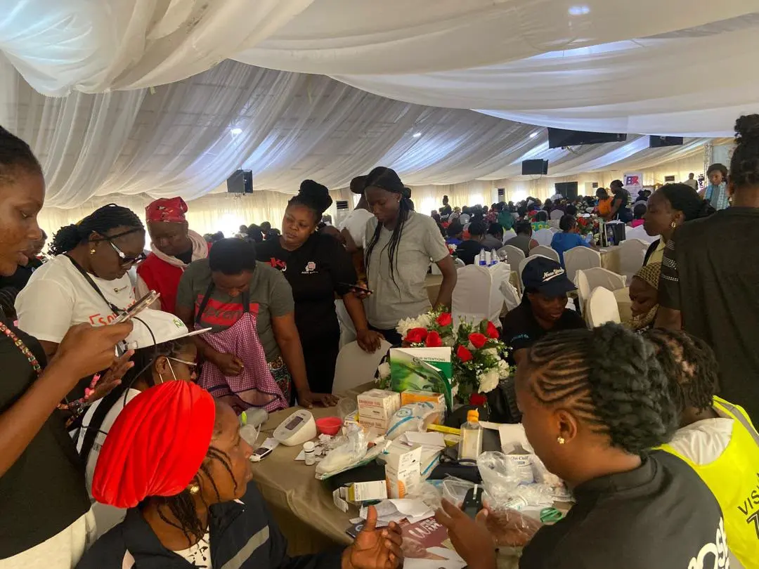 Volunteers supporting attendees